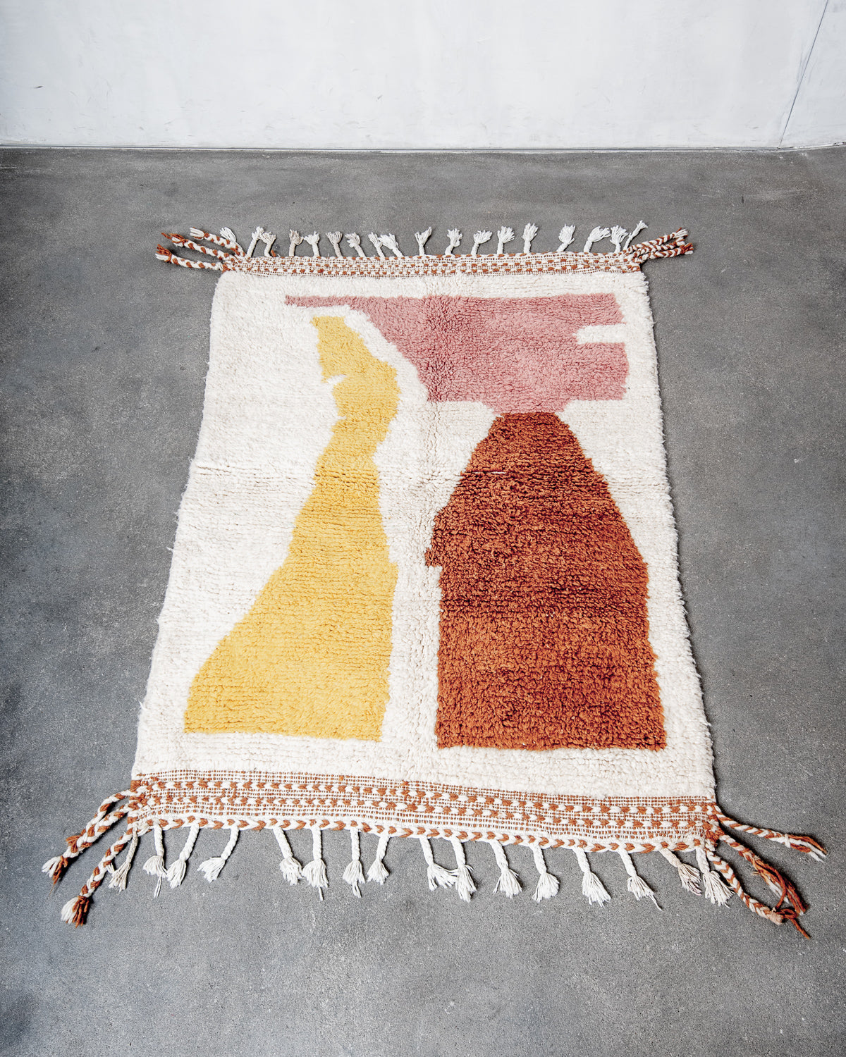 Modern, designer, handcrafted Berber rug from Morocco. Beniourain carpet with beautiful colours and patterns and fluffy wool texture.